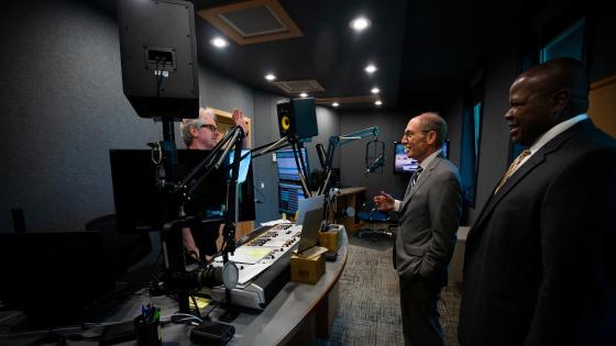 President Capilouto and others stand inside recording room at WUKY